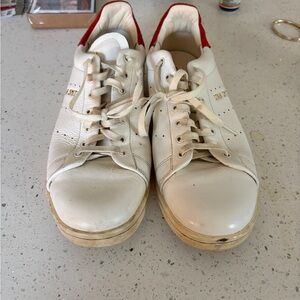 White Sneakers with Red Accents